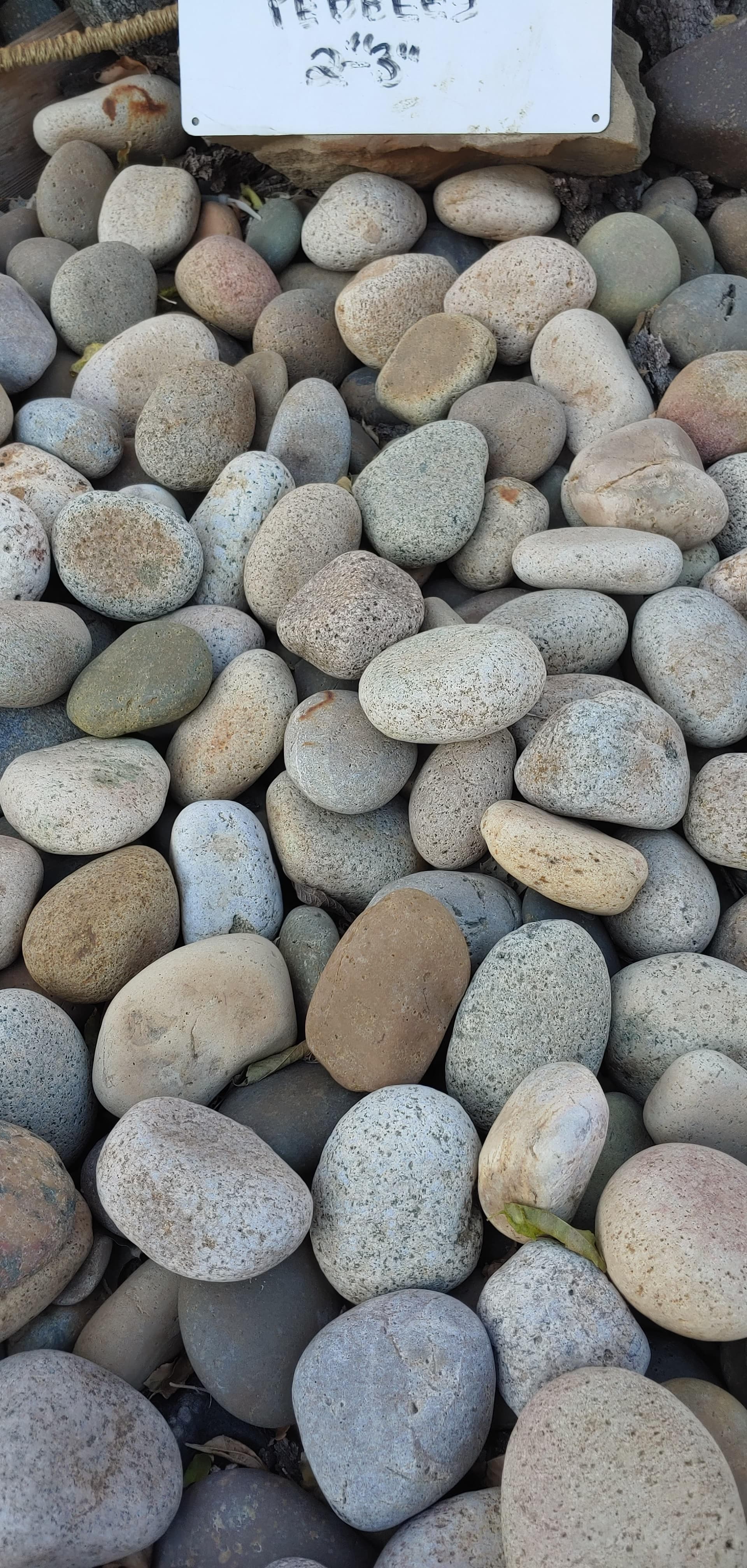 Gravel and river rock landscape materials in bulk at Round Rock Landscape Supplies